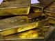 Gold prices ease; crude prices rally