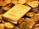 Gold slips on global cues, muted demand